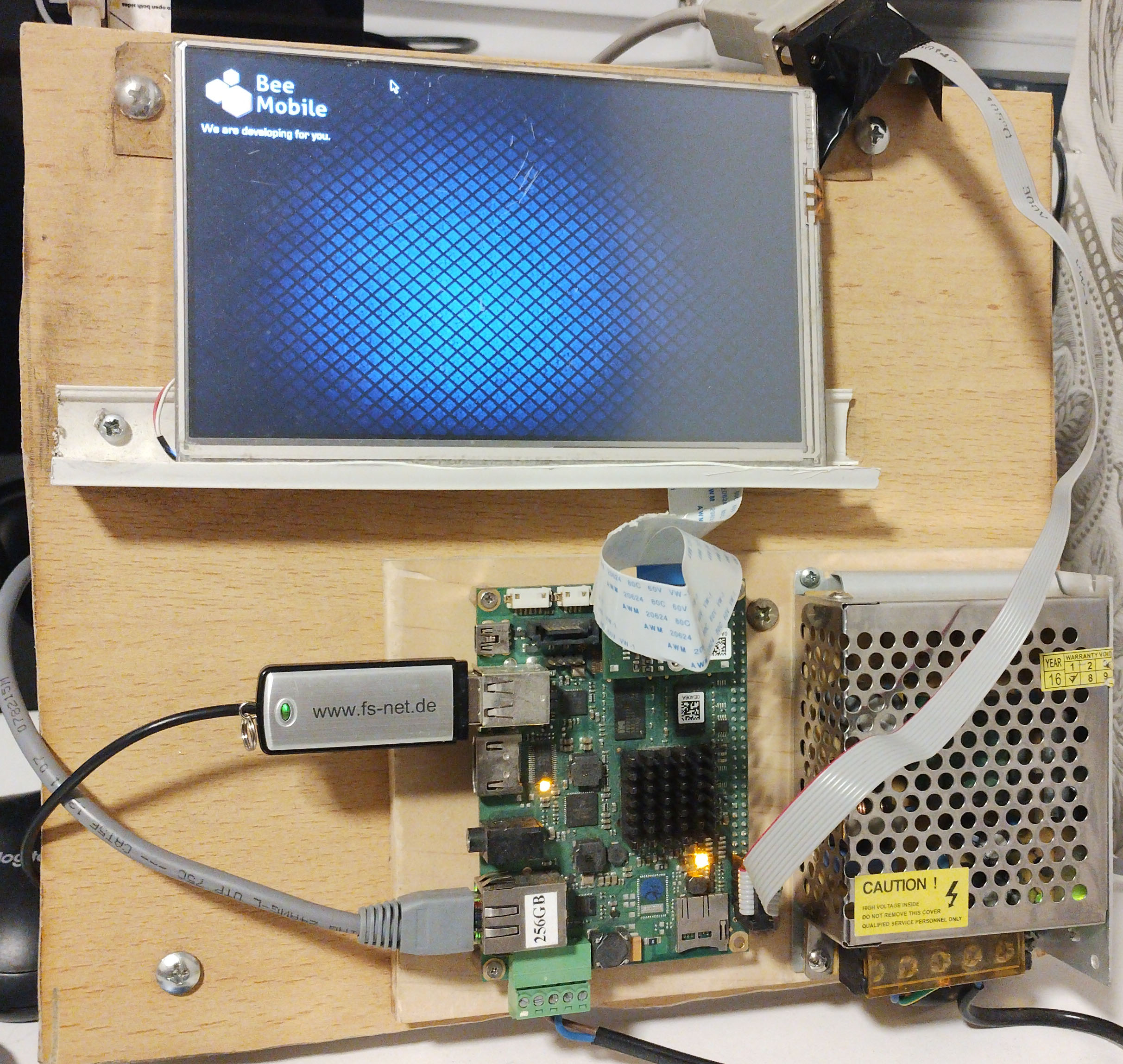 F&S armStone A9 assembled with display, cables, power supply, storage, and peripherals